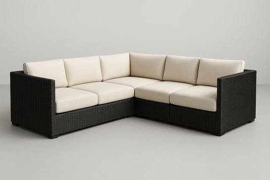 Canapé d'angle extérieur résine tressée noir coussins crème 3 places