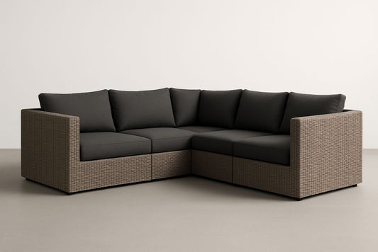 Canapé d'angle modulable en résine tressée marron avec coussins gris 