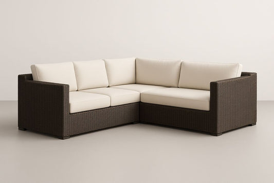 Canapé d'angle extérieur en résine tressée avec coussins crème